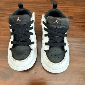 Nike Jordan Kids Black and White Sneakers with Gold Accent 7c